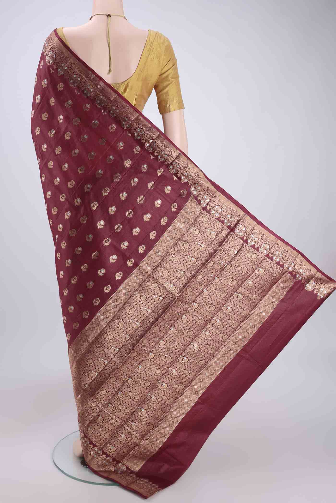 Flat view of Coffee Brown Banarasi Tussar Silk Saree with Thread Brocade on the body and Zari And Thread Border. 