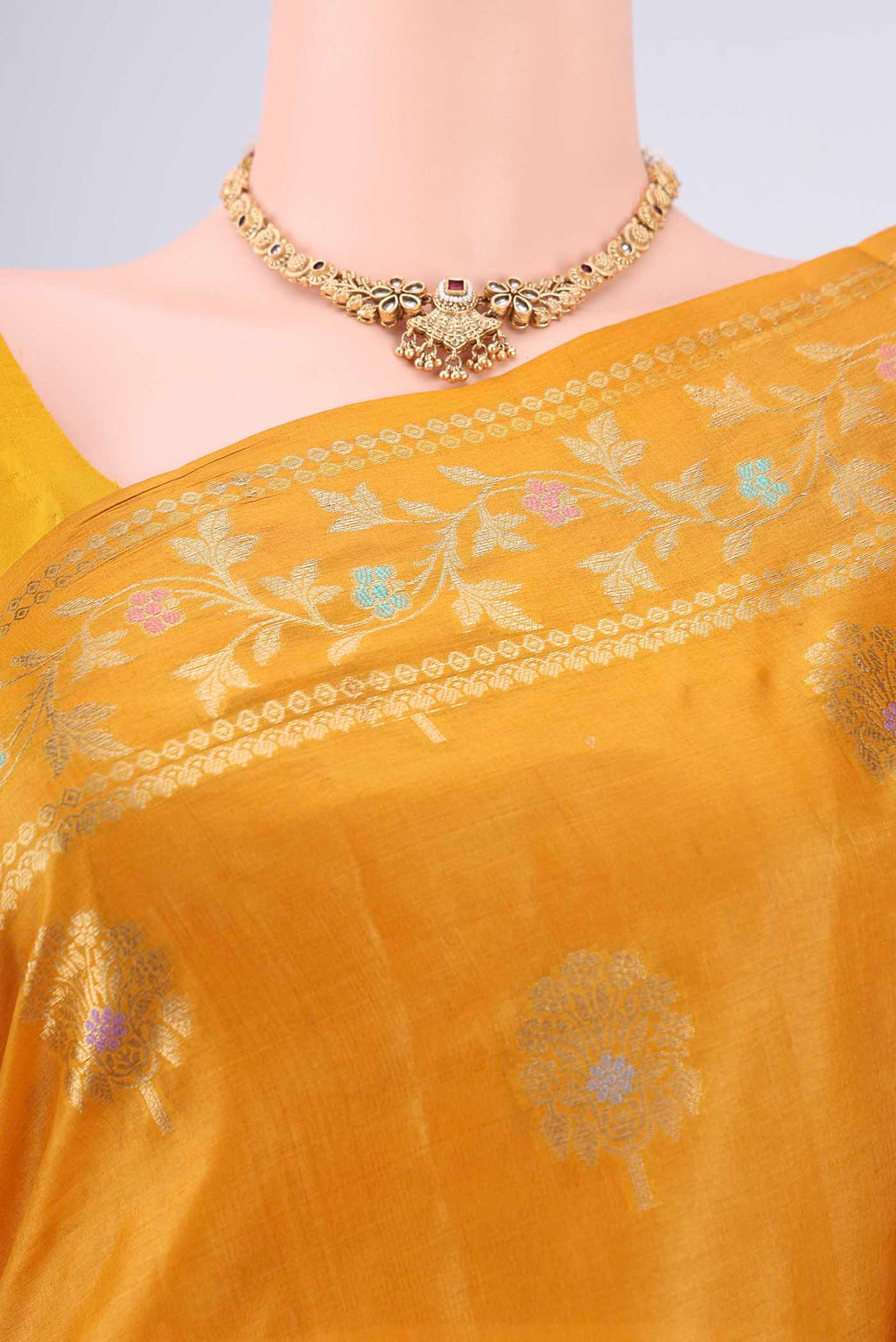 Border image of Yellow Banarasi Tussar Silk Saree with Zari And Thread Butta on the body and Zari And Thread Border. 