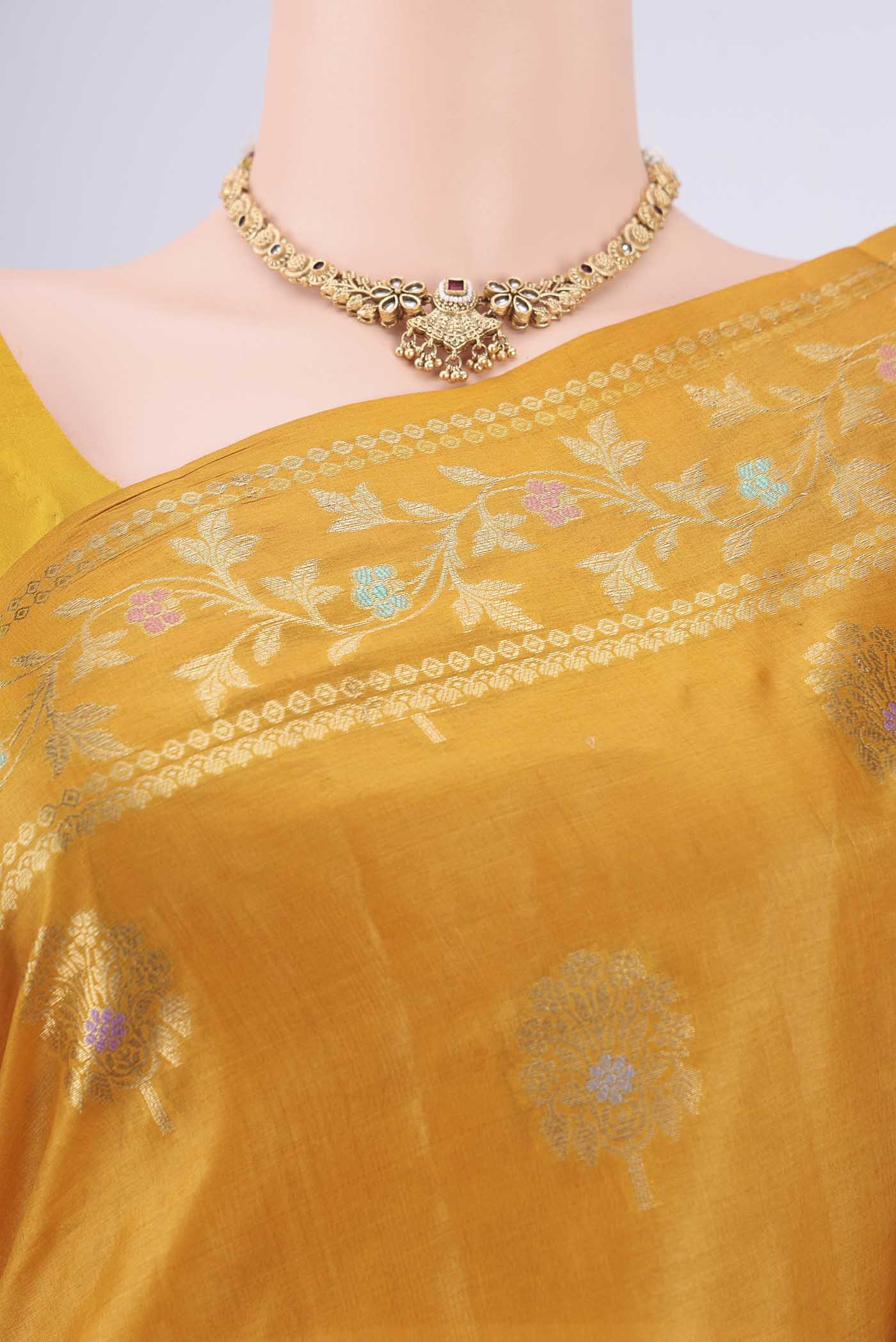 Border image of Yellow Banarasi Tussar Silk Saree with Zari And Thread Butta on the body and Zari And Thread Border. 