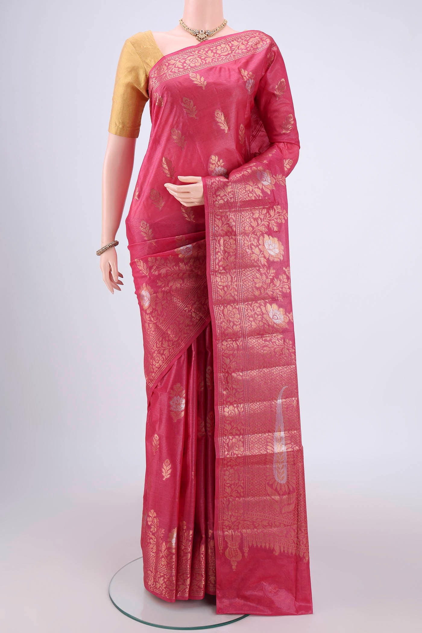 Pink Banarasi Tussar Silk Saree with Zari And Thread Butta on the body and Zari And Thread Border.  displayed on a mannequin