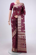 Purple Banarasi Tussar Silk Saree with Thread Brocade on the body and Zari And Thread Border.  displayed on a mannequin