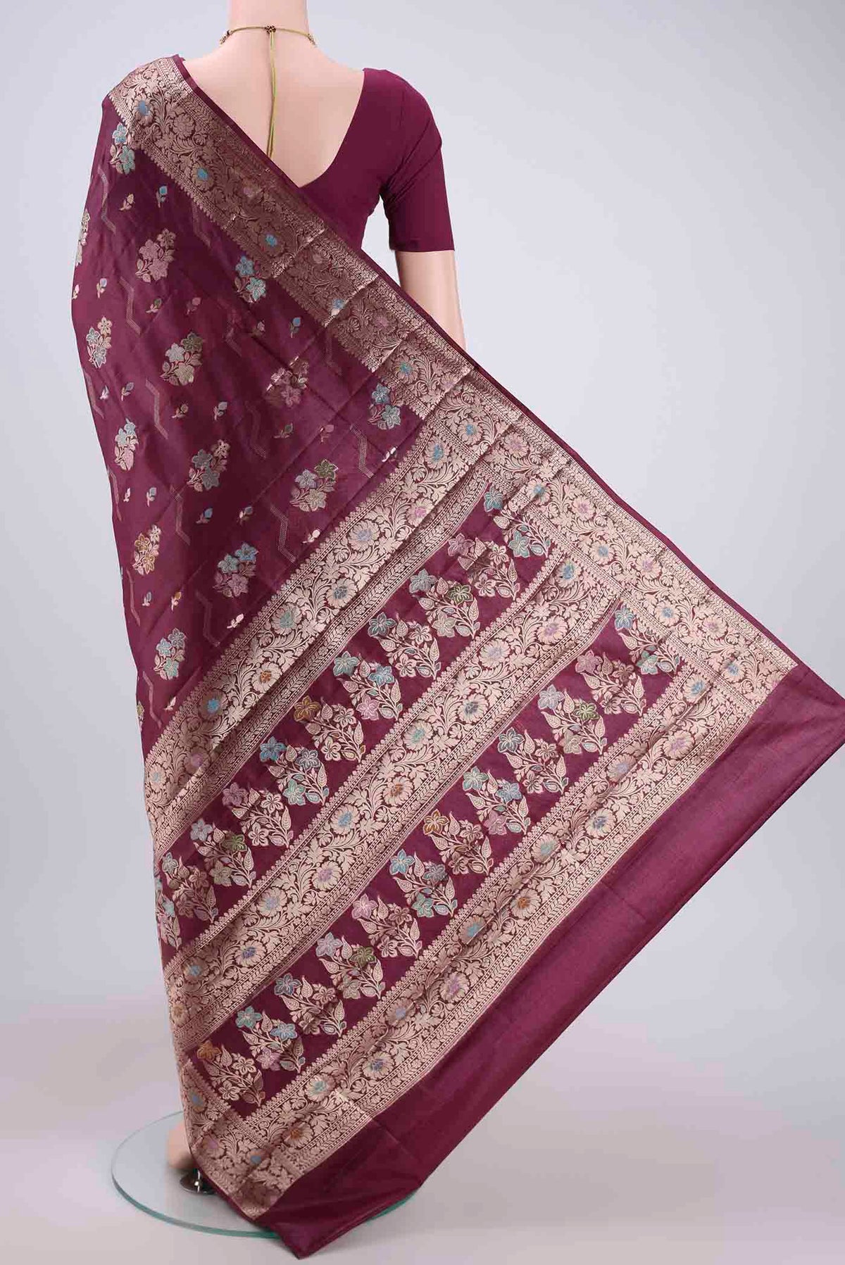 Flat view of Purple Banarasi Tussar Silk Saree with Thread Brocade on the body and Zari And Thread Border. 