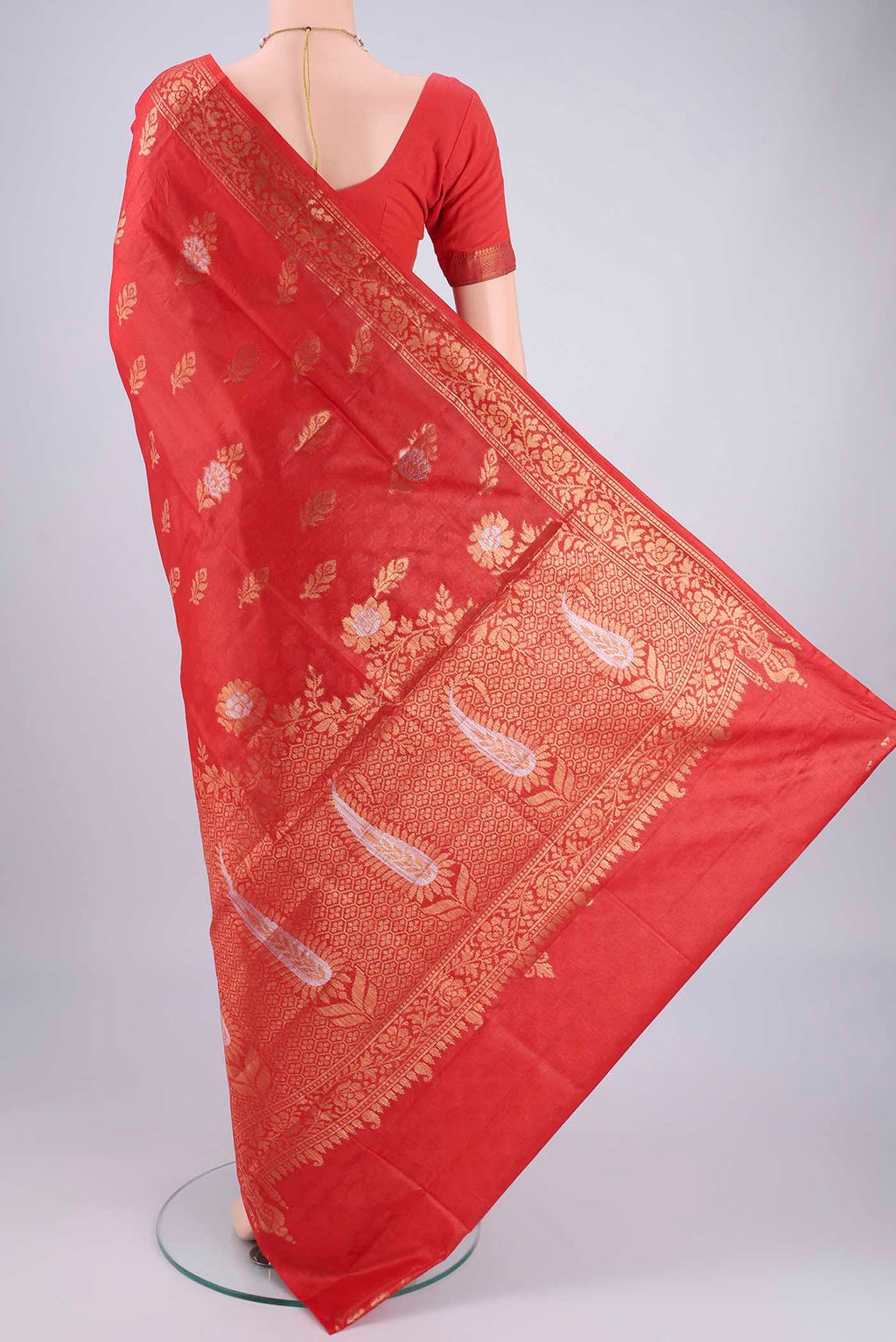 Flat view of Imperial Red Banarasi Tussar Silk Saree with Zari Butta on the body and Zari Border. 