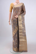 Dark Beige Banarasi Tussar Silk Saree with Zari And Thread Butta on the body and Zari And Thread Border.  displayed on a mannequin