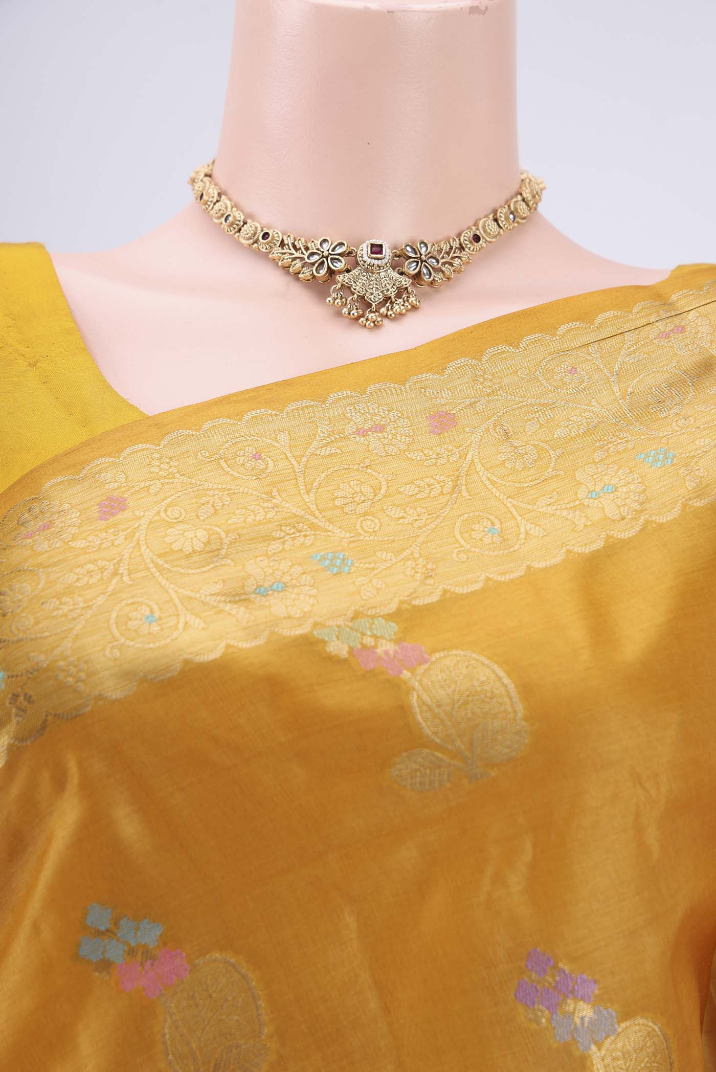 Border image of Yellow Banarasi Tussar Silk Saree with Zari And Thread Butta on the body and Zari And Thread Border. 