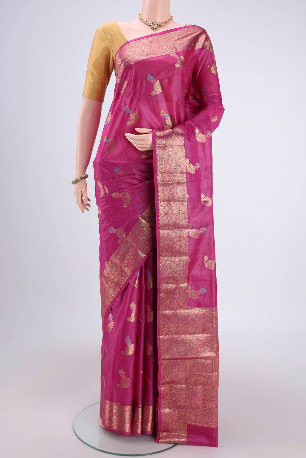 Magenta Banarasi Tussar Silk Saree with Thread Brocade on the body and Zari And Thread Border.  displayed on a mannequin