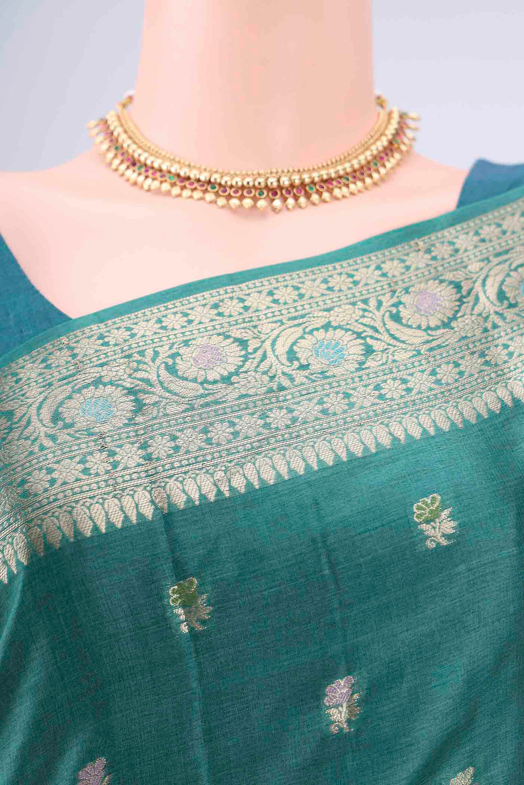 Border image of Green Banarasi Tussar Silk Saree with Zari Butta on the body and Zari And Thread Border. 