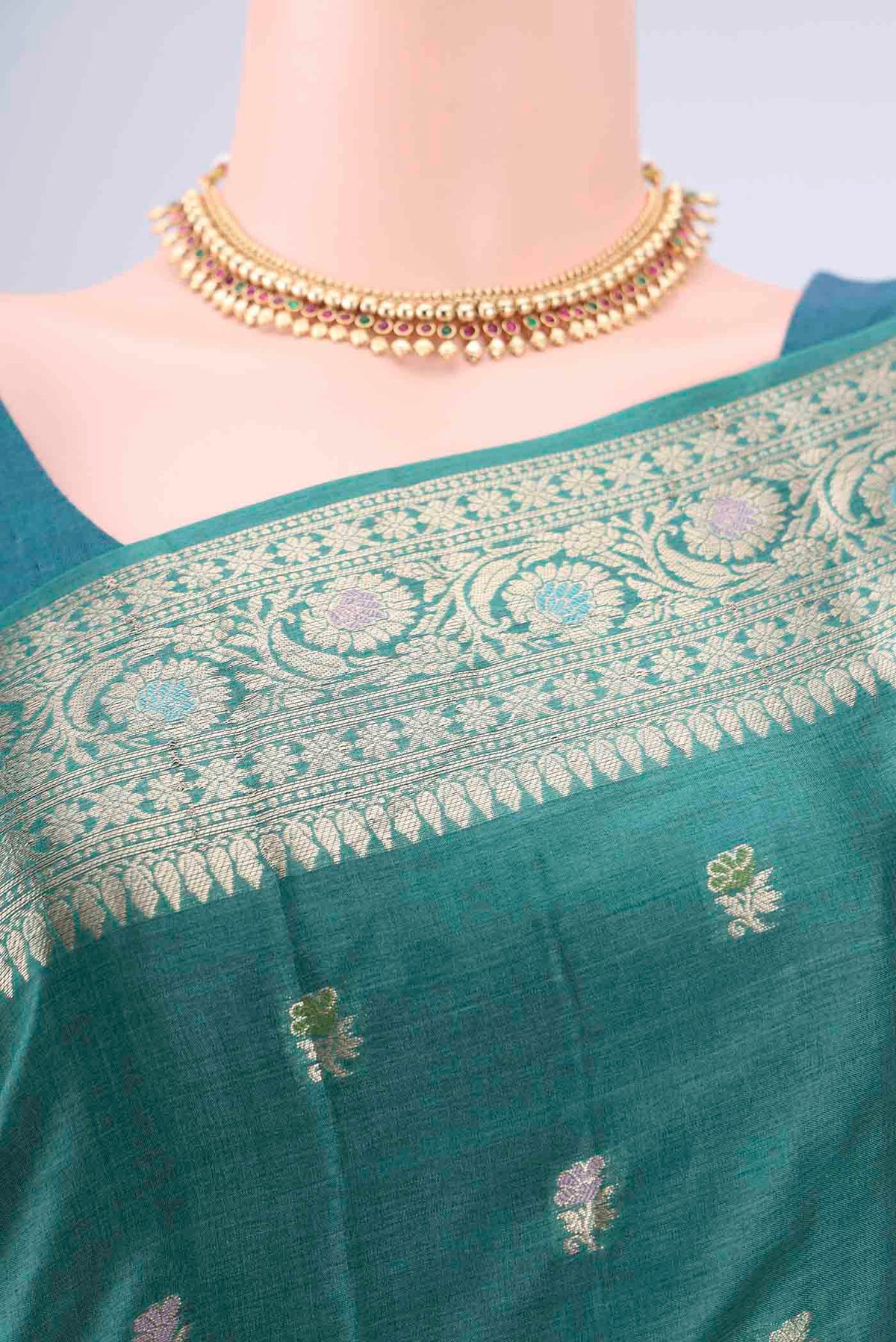 Border image of Green Banarasi Tussar Silk Saree with Zari Butta on the body and Zari And Thread Border. 