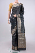 Grey Banarasi Tussar Silk Saree with Thread Brocade on the body and Zari And Thread Border.  displayed on a mannequin