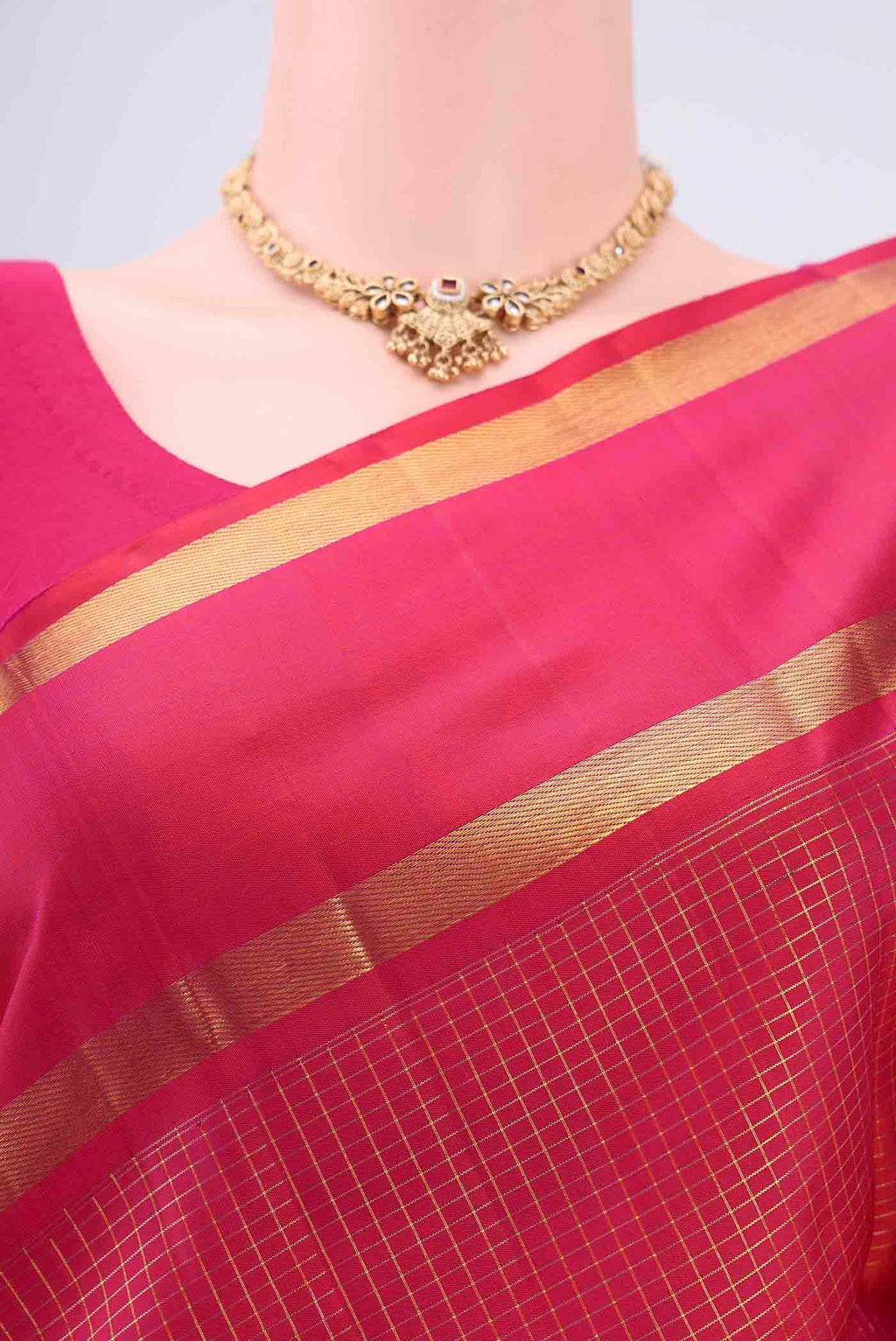 Border image of Pure Silk Pure Zari Dark Pink Kanjivaram Saree with Checked design on the body and Zari Border. 
