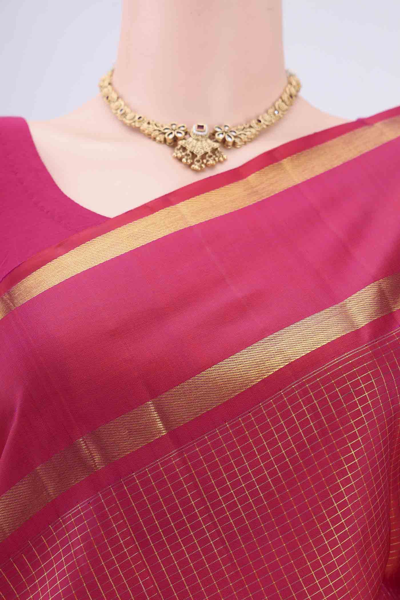 Border image of Pure Silk Pure Zari Dark Pink Kanjivaram Saree with Checked design on the body and Zari Border. 