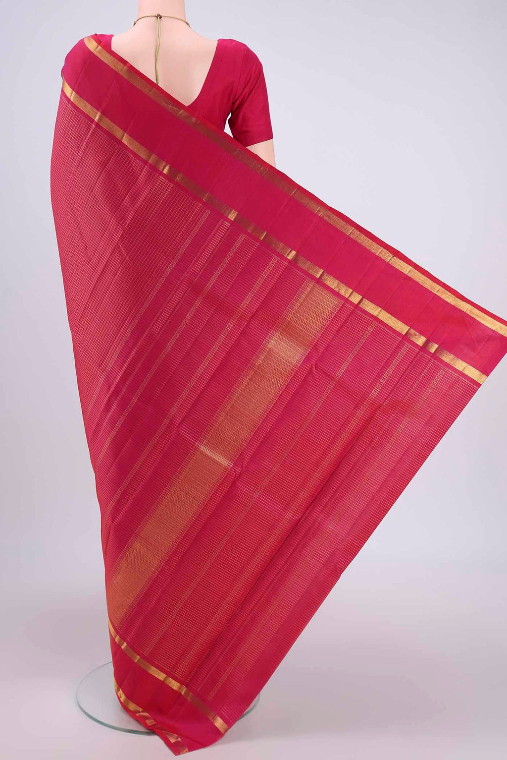 Flat view of Pure Silk Pure Zari Dark Pink Kanjivaram Saree with Checked design on the body and Zari Border. 