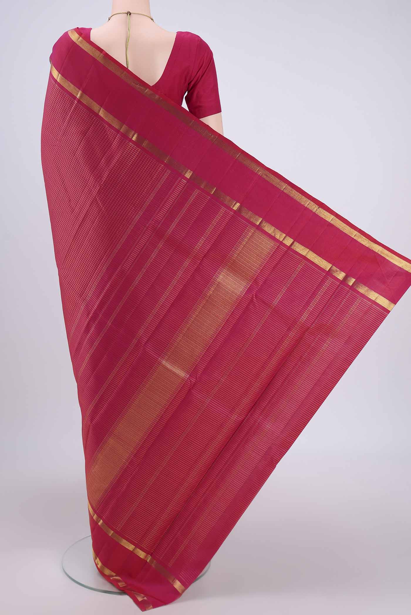 Flat view of Pure Silk Pure Zari Dark Pink Kanjivaram Saree with Checked design on the body and Zari Border. 