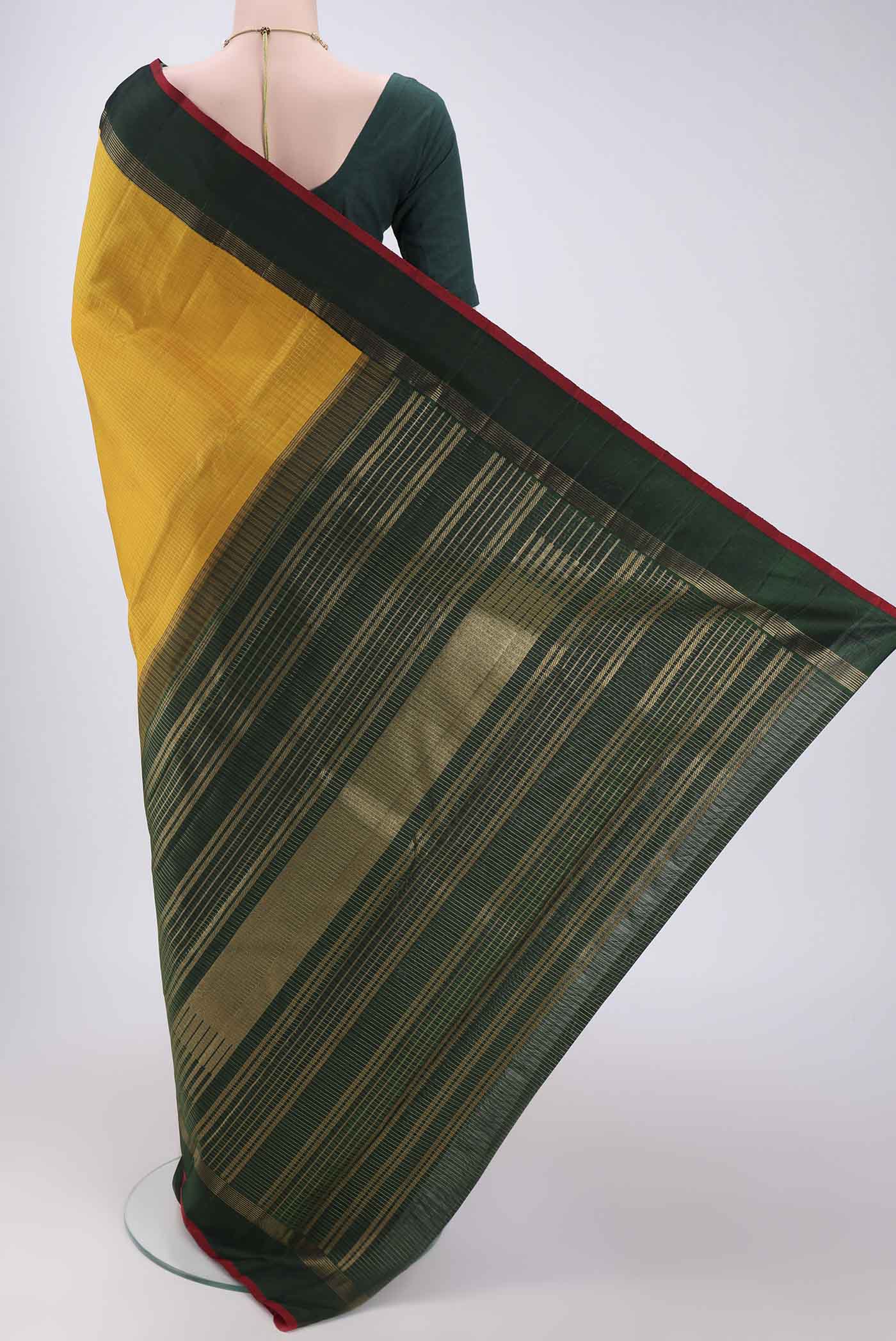 Flat view of Pure Silk Pure Zari Yellow Kanjivaram Saree with Checked design on the body and Zari Border. 