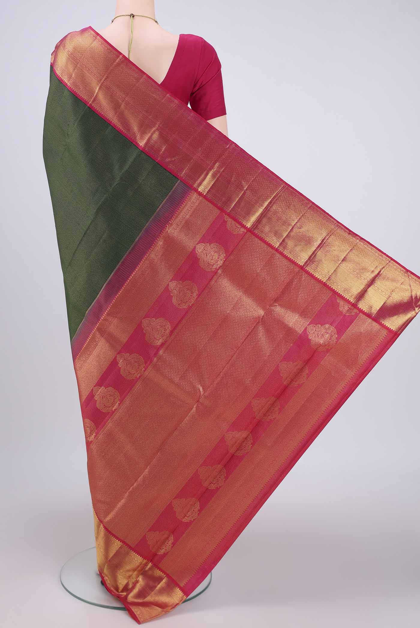 Flat view of Pure Silk Pure Zari Bottle Green Kanchipuram Saree with Checked design on the body and Zari Border. 