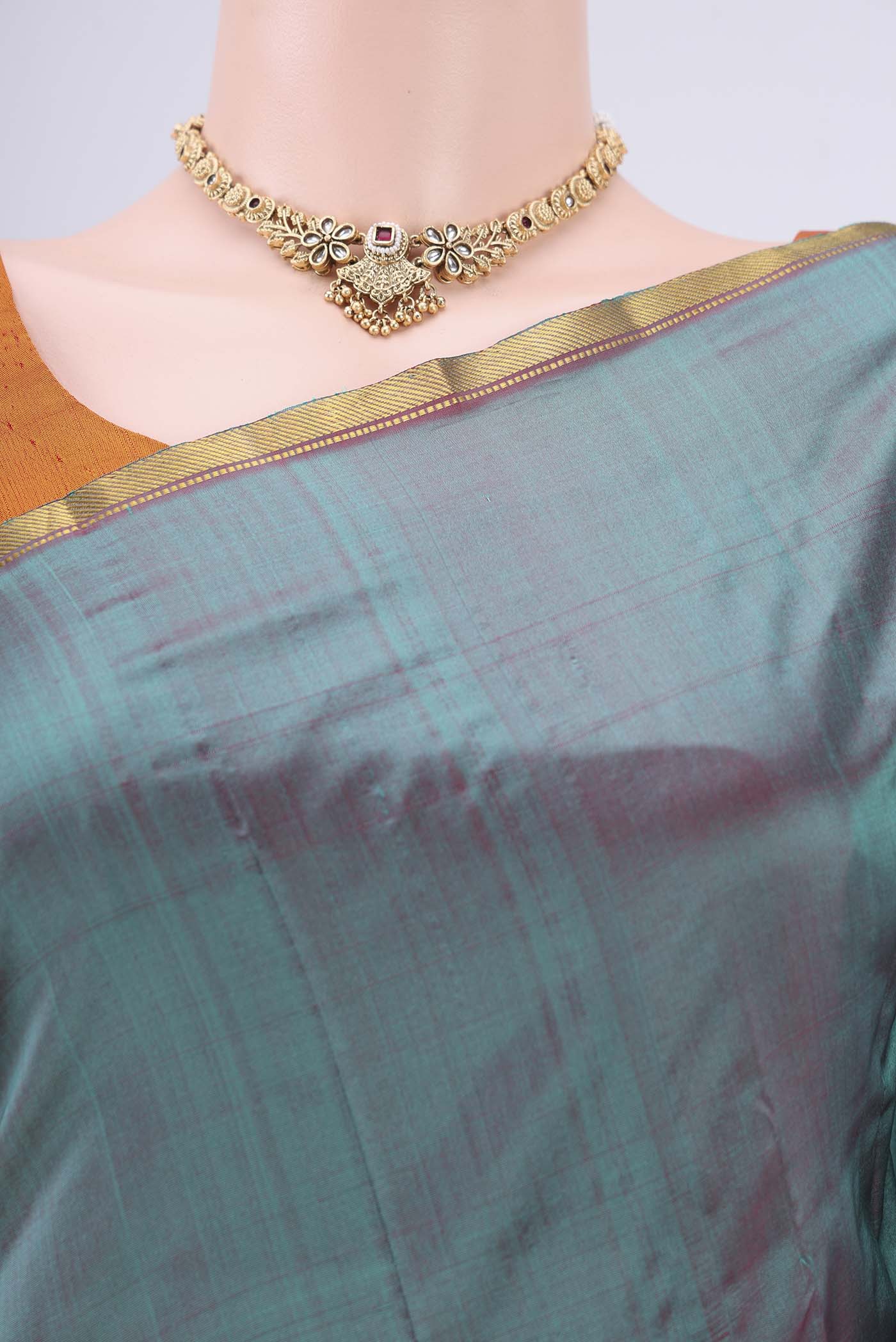Border image of Sea Green Kanchipuram Silk Saree with Plain Body and Zari Border. 