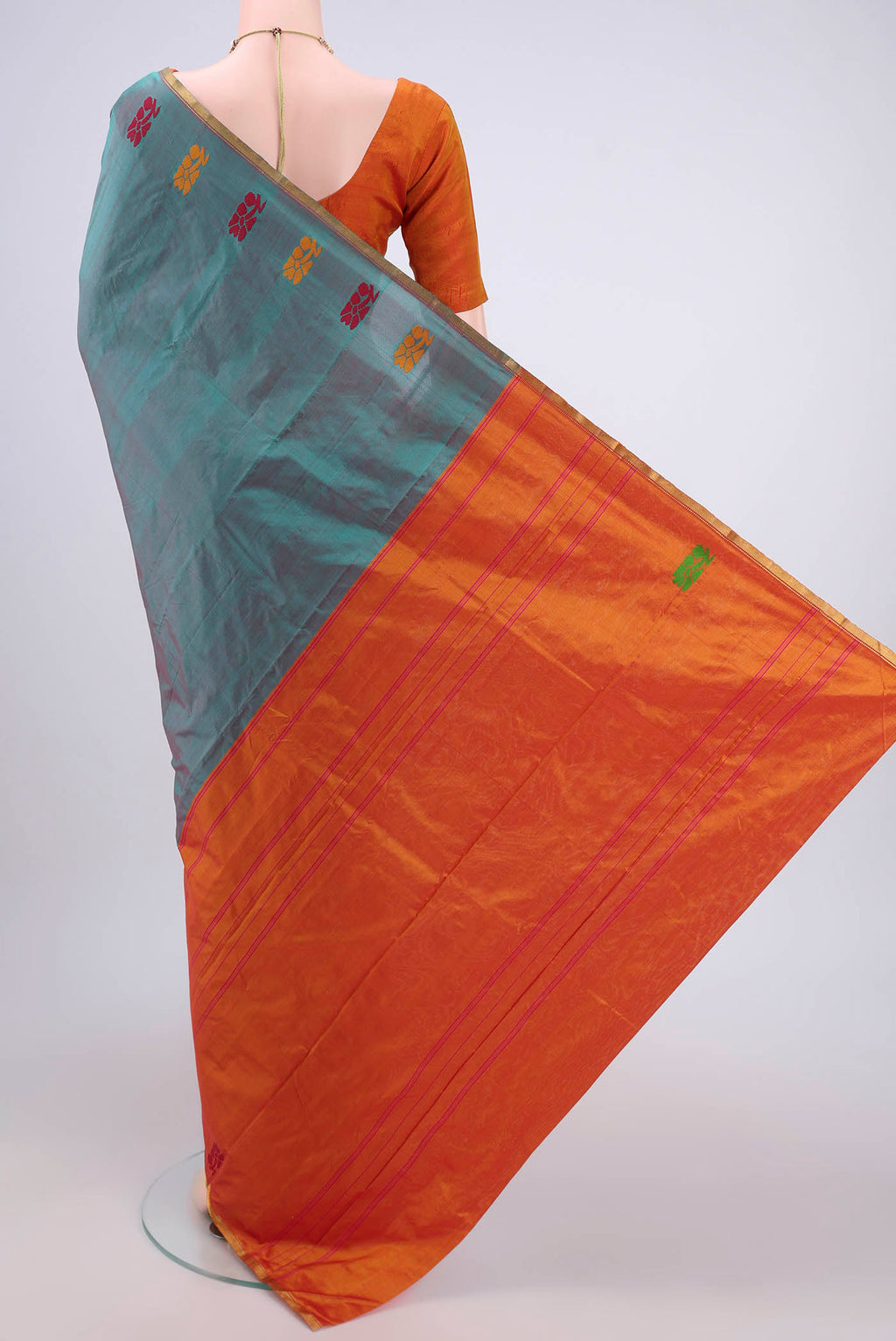 Flat view of Sea Green Kanchipuram Silk Saree with Plain Body and Zari Border. 