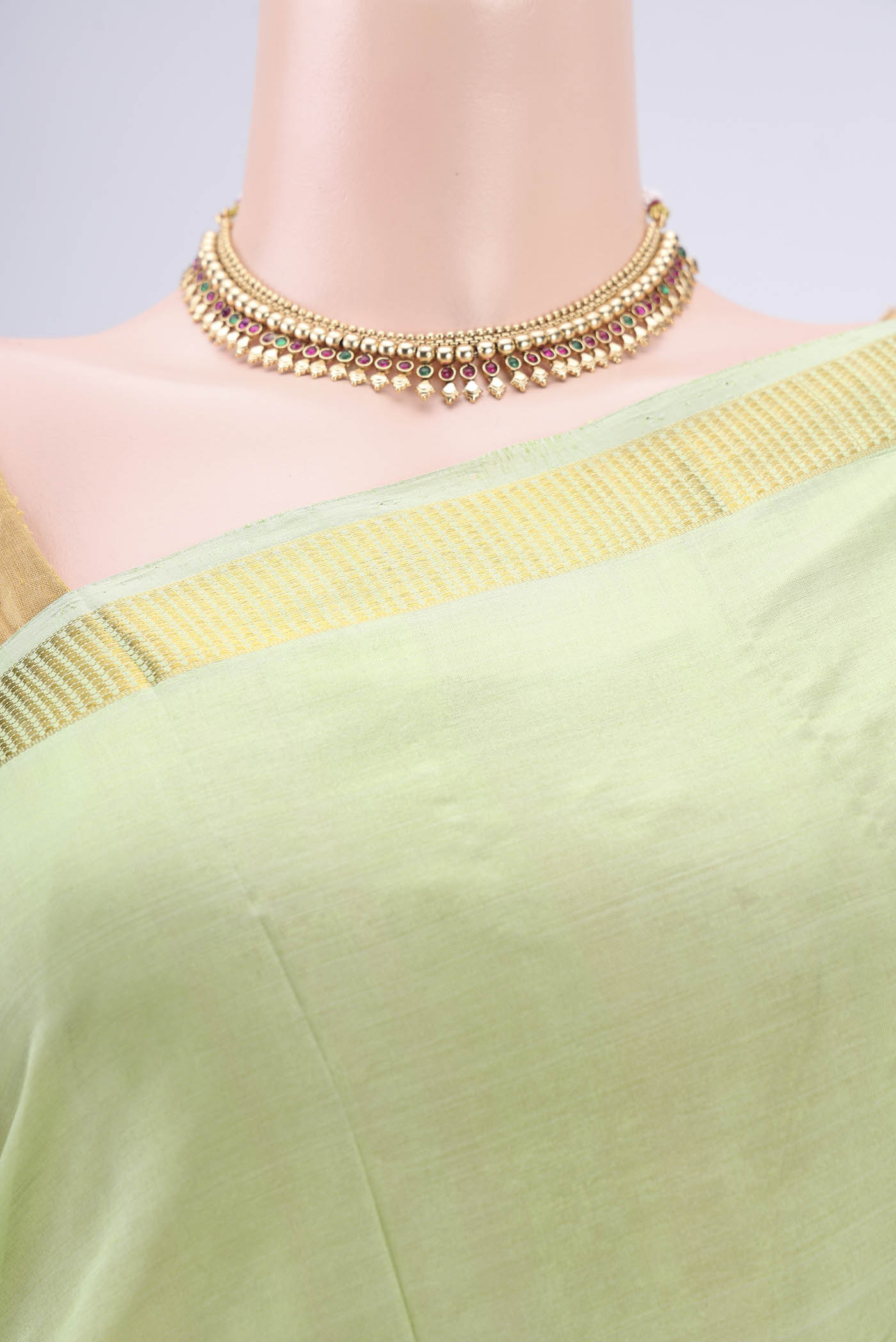Border image of Light Green Kanchipuram Silk Saree with Plain Body and Zari Border. 