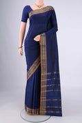 Navy Blue Blended Bangalore Silk Saree with Jacquard design on the body and Zari Border.  displayed on a mannequin