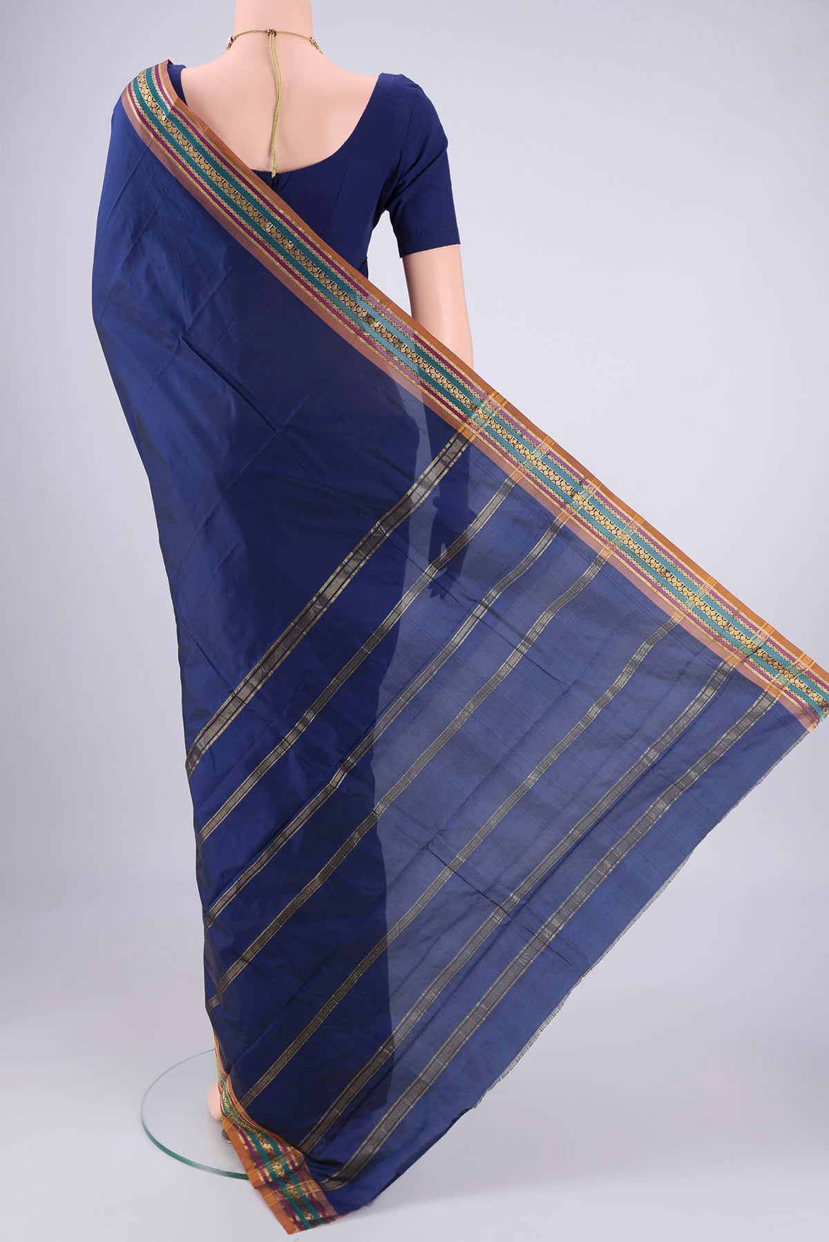 Flat view of Navy Blue Blended Bangalore Silk Saree with Jacquard design on the body and Zari Border. 