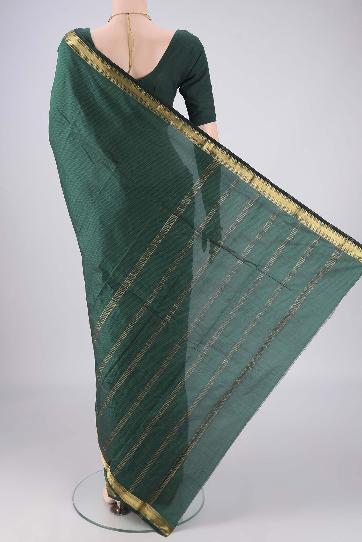 Flat view of Bottle Green Blended Bangalore Silk Saree with Jacquard design on the body and Zari Border. 