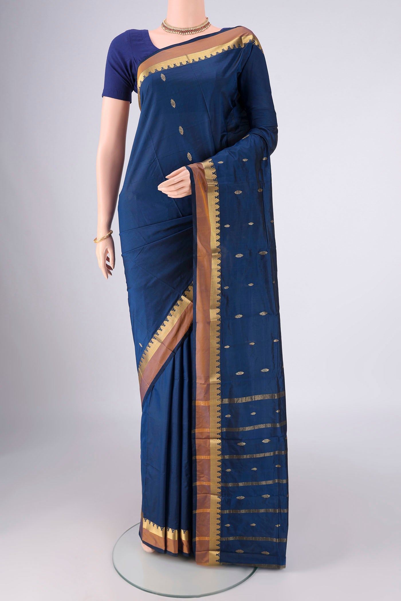 Dark Blue Blended Bangalore Silk Saree with Zari Butta on the body and Zari Border.  displayed on a mannequin