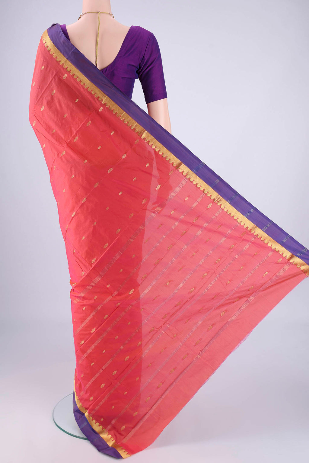 Flat view of Coral Blended Bangalore Silk Saree with Zari Butta on the body and Zari Border. 