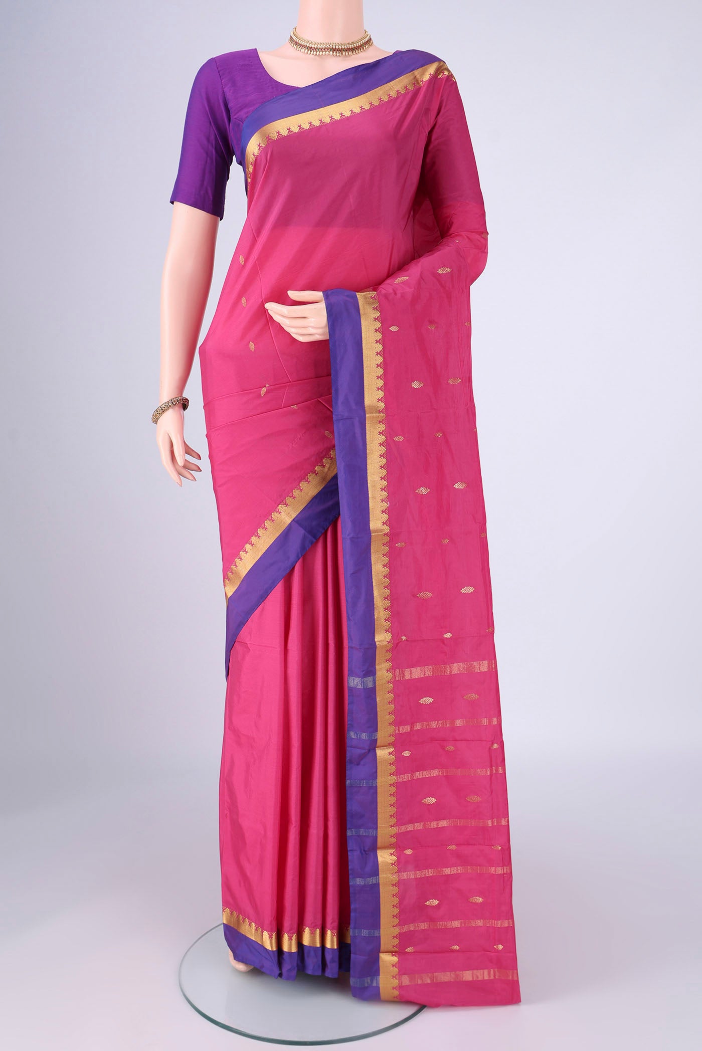 Pink Blended Bangalore Silk Saree with Zari Butta on the body and Zari Border.  displayed on a mannequin