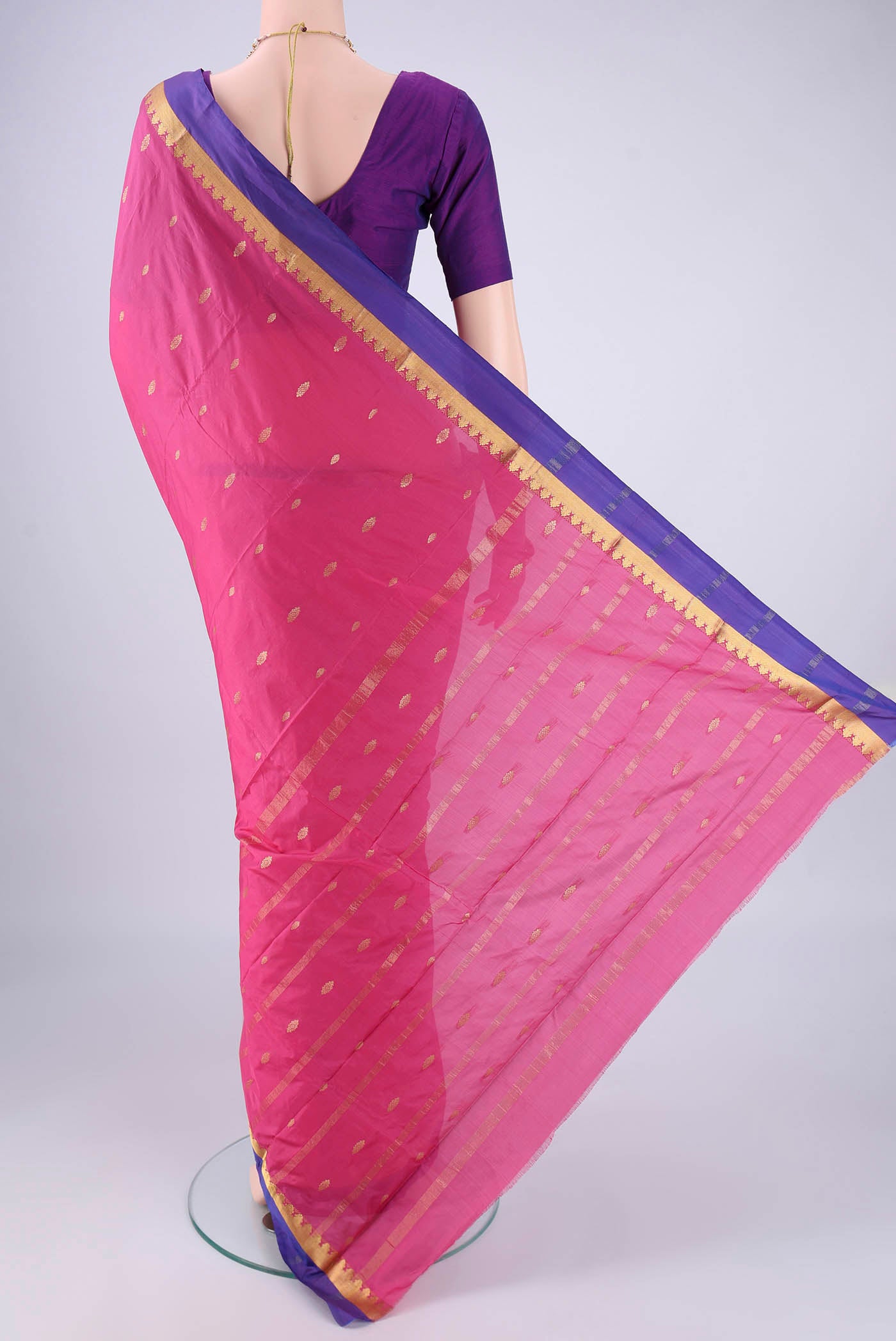Flat view of Pink Blended Bangalore Silk Saree with Zari Butta on the body and Zari Border. 