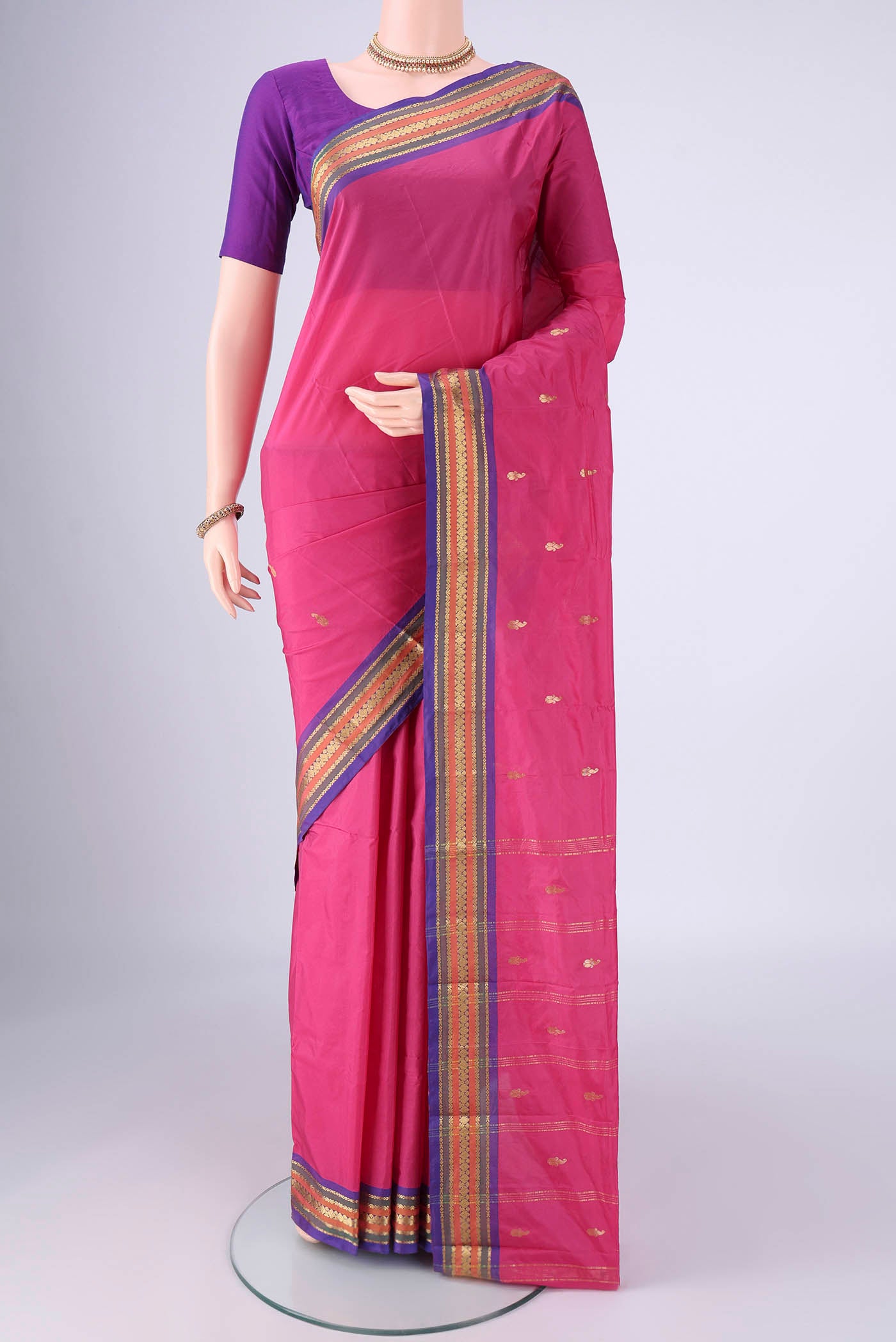 Pink Blended Bangalore Silk Saree with Zari Butta on the body and Zari Border.  displayed on a mannequin