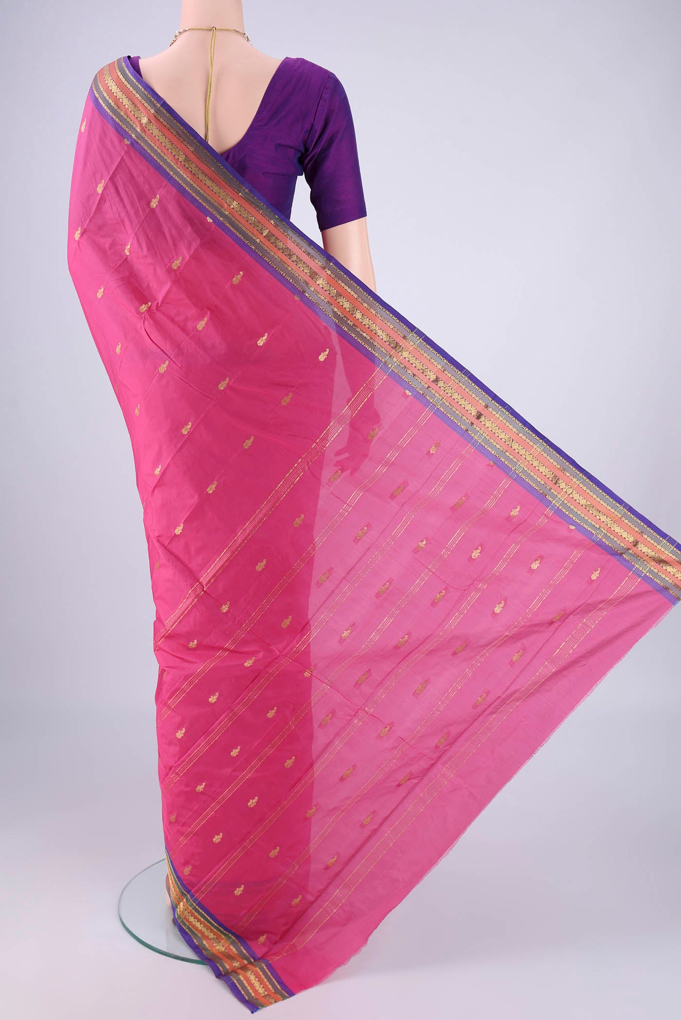 Flat view of Pink Blended Bangalore Silk Saree with Zari Butta on the body and Zari Border. 