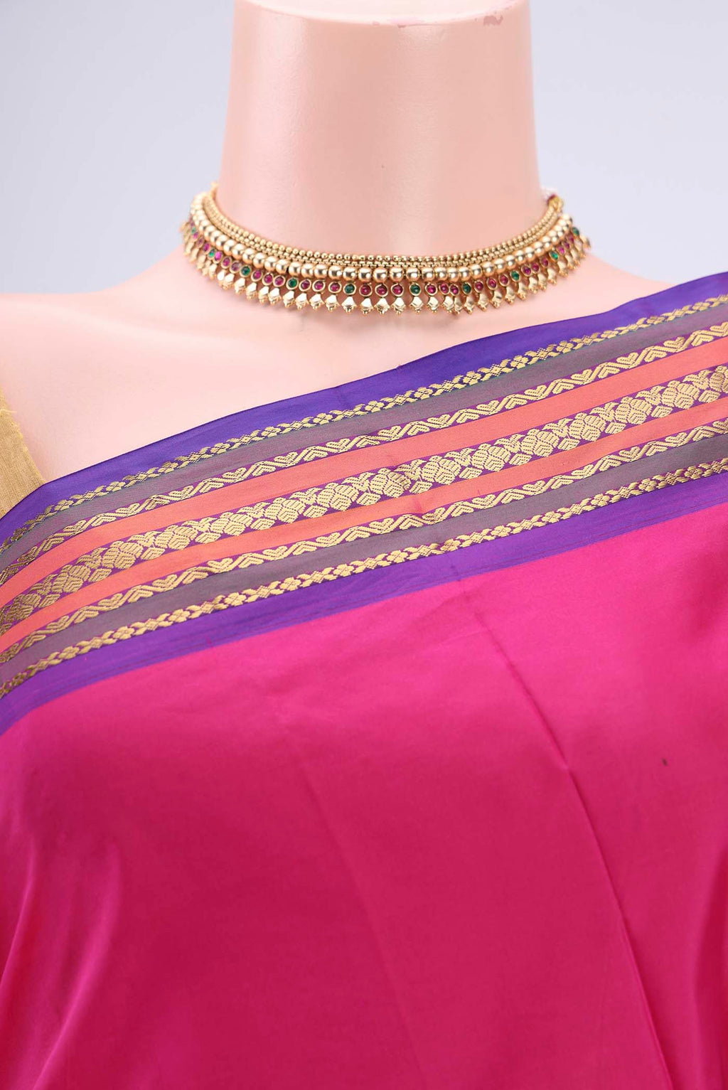 Border image of Rani Pink Bangalore Silk Saree with Thread Butta on the body and Zari Border. 