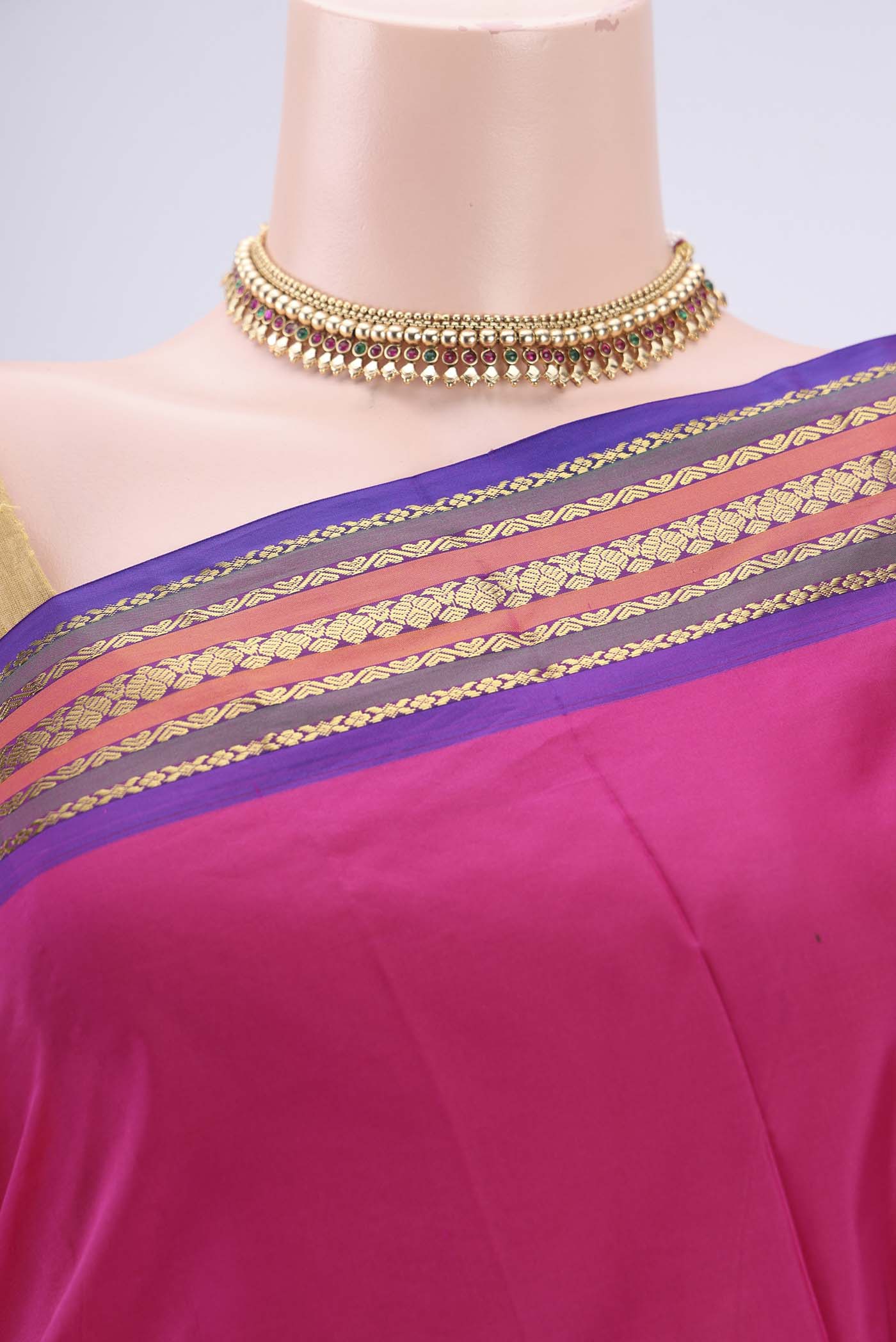 Border image of Rani Pink Bangalore Silk Saree with Thread Butta on the body and Zari Border. 