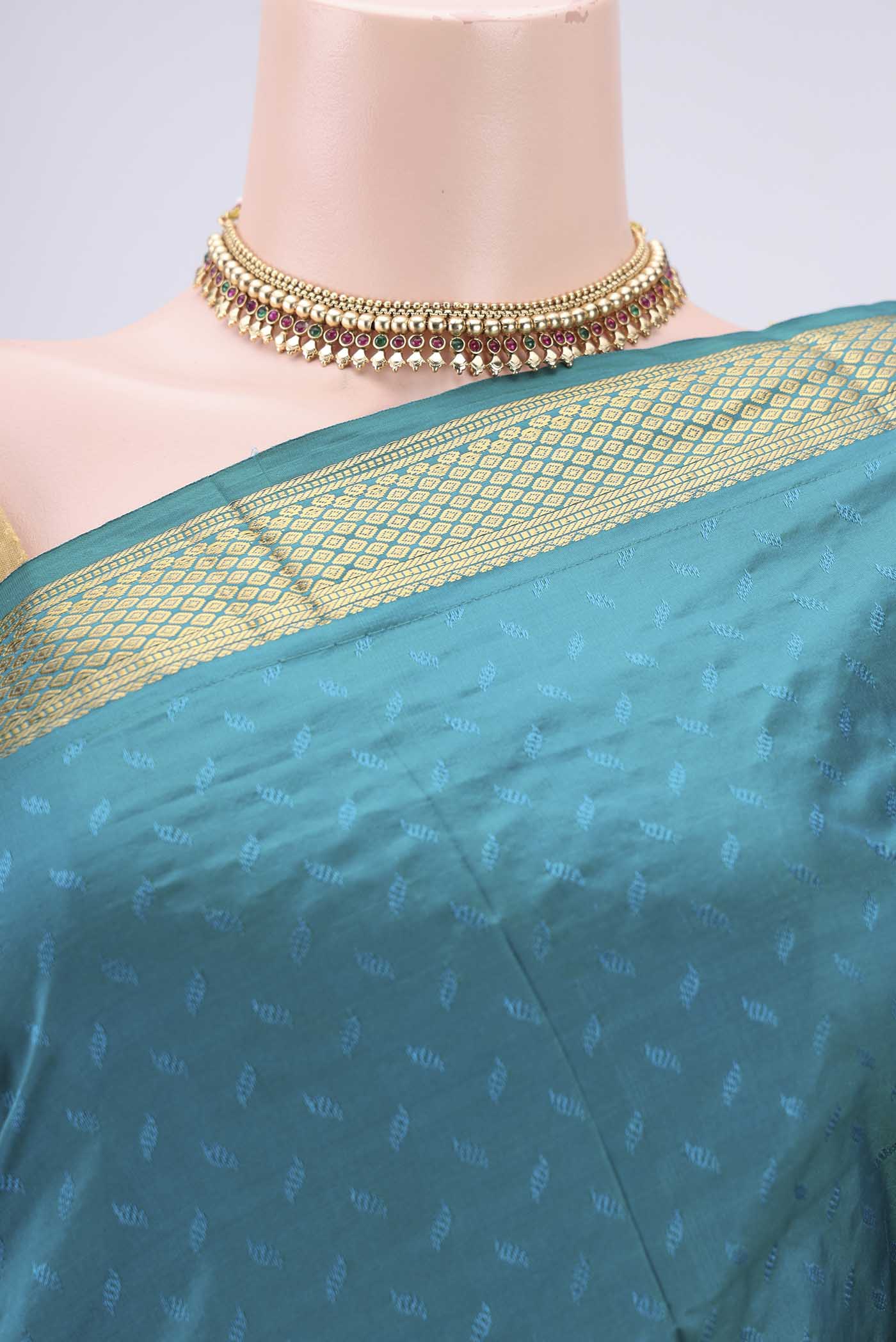 Border image of Sea Green Dual Tone Bangalore Silk Saree with Jacquard design on the body and Zari Border. 