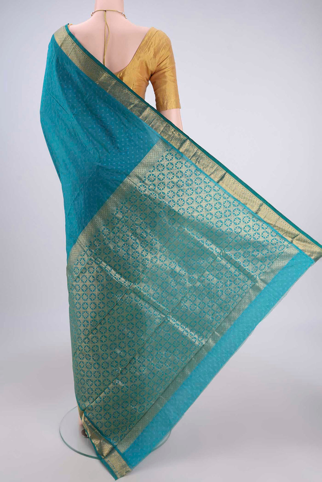 Flat view of Sea Green Dual Tone Bangalore Silk Saree with Jacquard design on the body and Zari Border. 