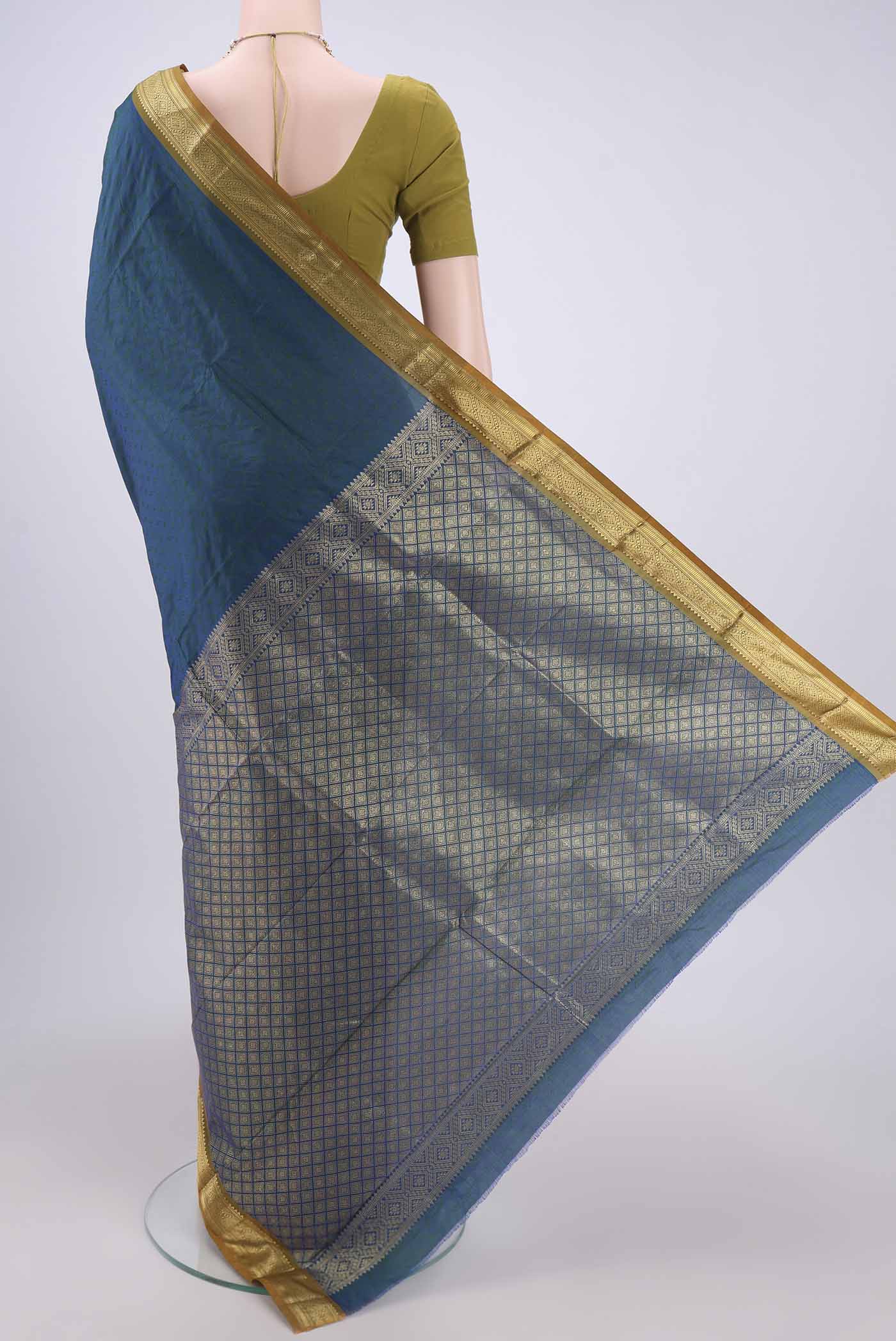 Flat view of Peacock Blue Dual Tone Bangalore Silk Saree with Jacquard design on the body and Zari Border. 