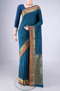 Blue Blended Bangalore Silk Saree with Zari Butta on the body and Zari Border.  displayed on a mannequin