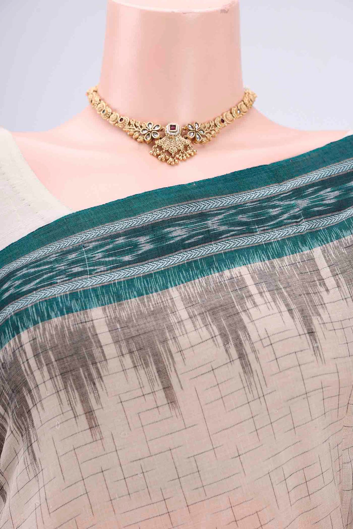 Border image of Beige Pochampally Cotton Saree with Ikat design on the body and Ikat Border. 