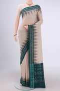 Beige Pochampally Cotton Saree with Ikat design on the body and Ikat Border.  displayed on a mannequin