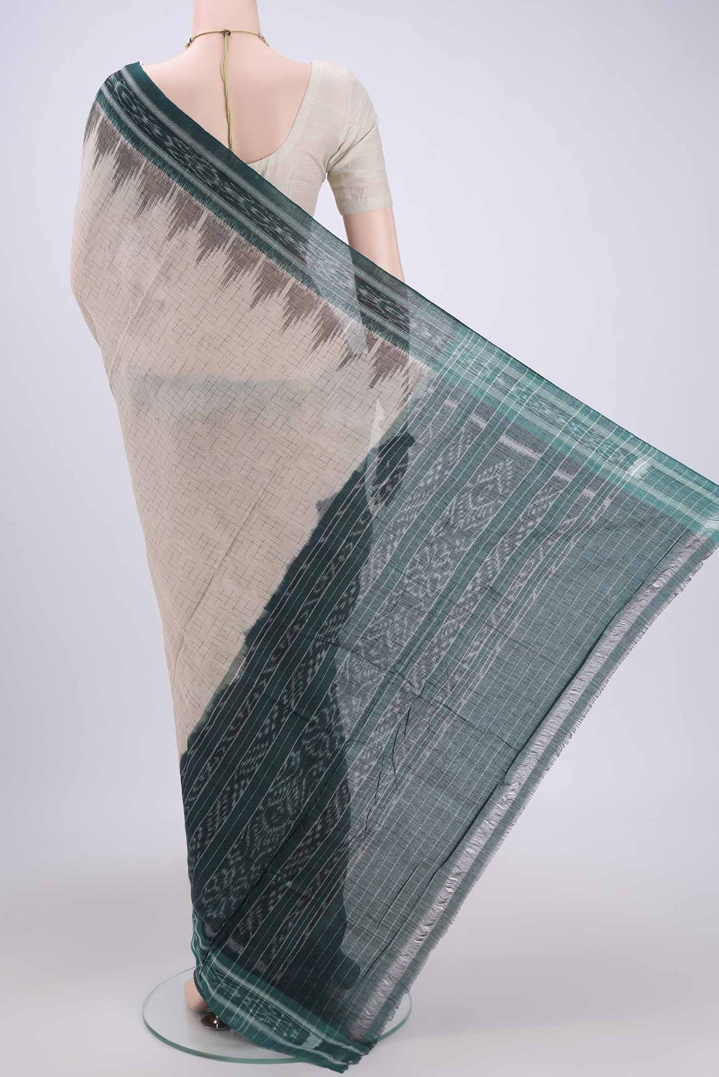 Flat view of Beige Pochampally Cotton Saree with Ikat design on the body and Ikat Border. 