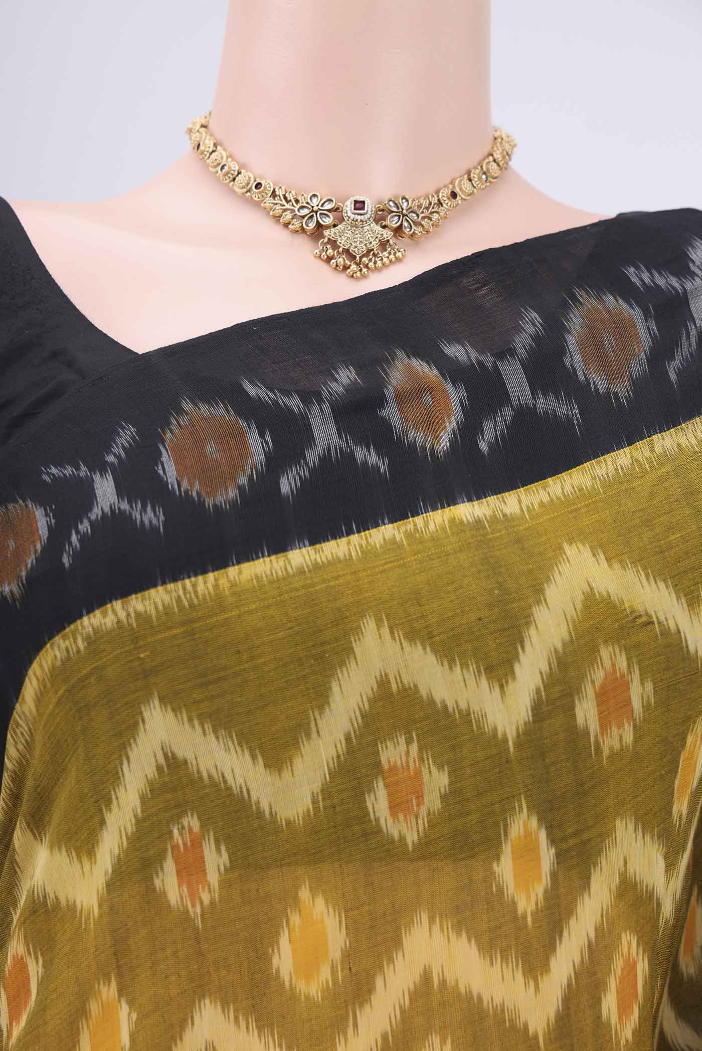 Border image of Mehandi Green Pochampally Cotton Saree with Ikat design on the body and Ikat Border. 
