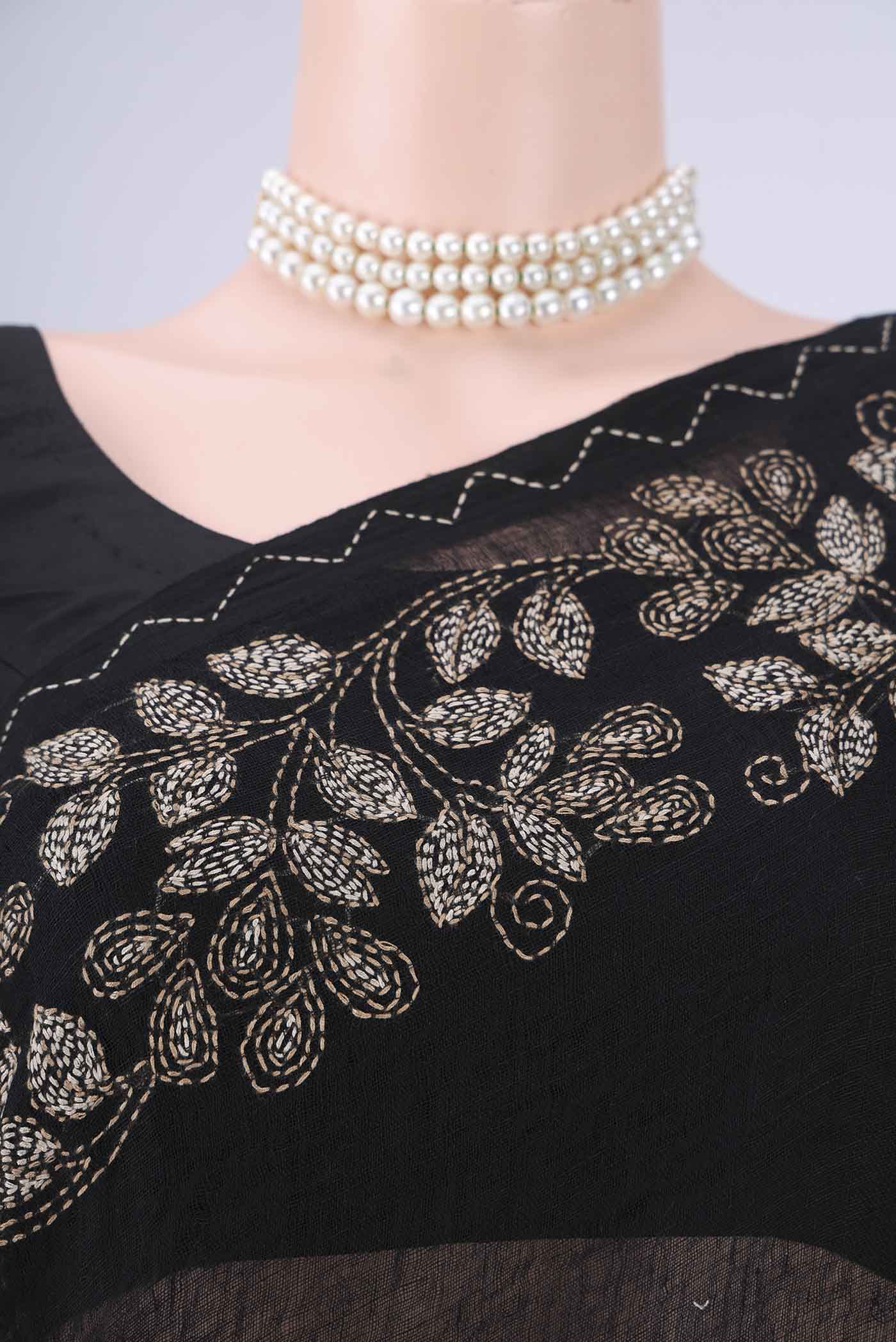Border image of Black Linen Cotton Saree with Kantha Work on the body and Thread Border. 