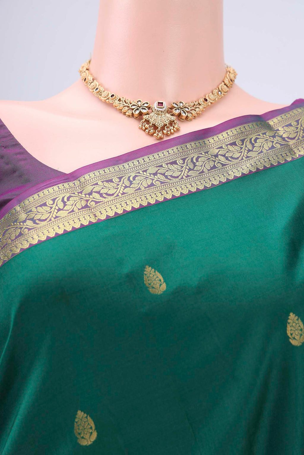 Border image of Bottle Green Kanjivaram Silk Saree with Zari Butta on the body and Zari Border. 