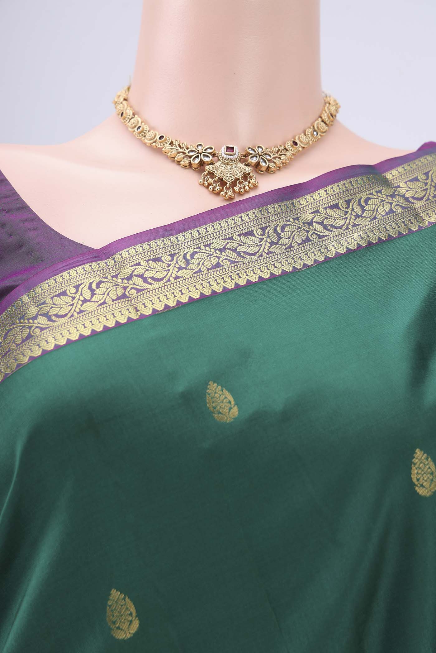 Border image of Bottle Green Kanjivaram Silk Saree with Zari Butta on the body and Zari Border. 