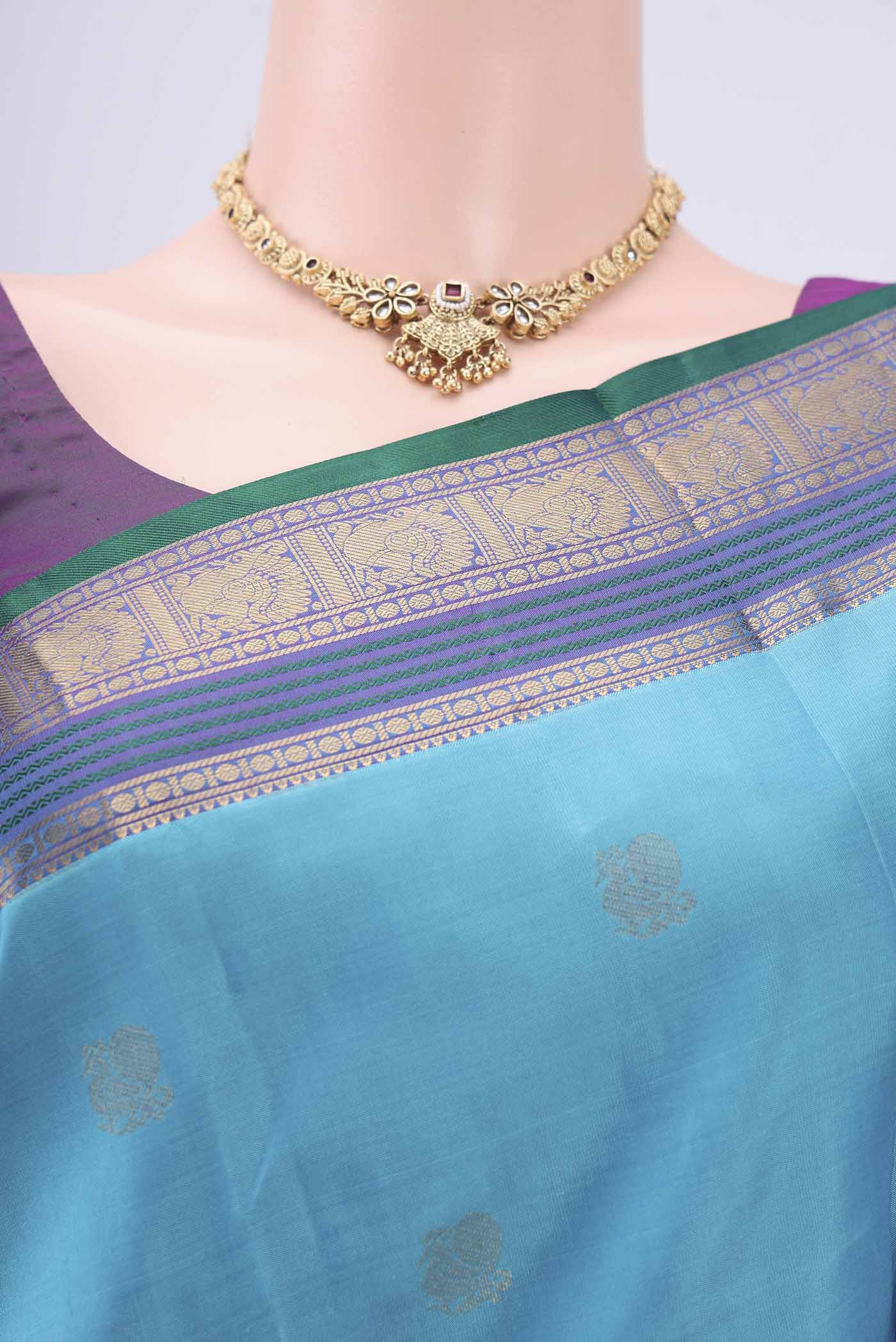 Border image of Blue Kanchipuram Silk Saree with Zari Butta on the body and Zari Border. 