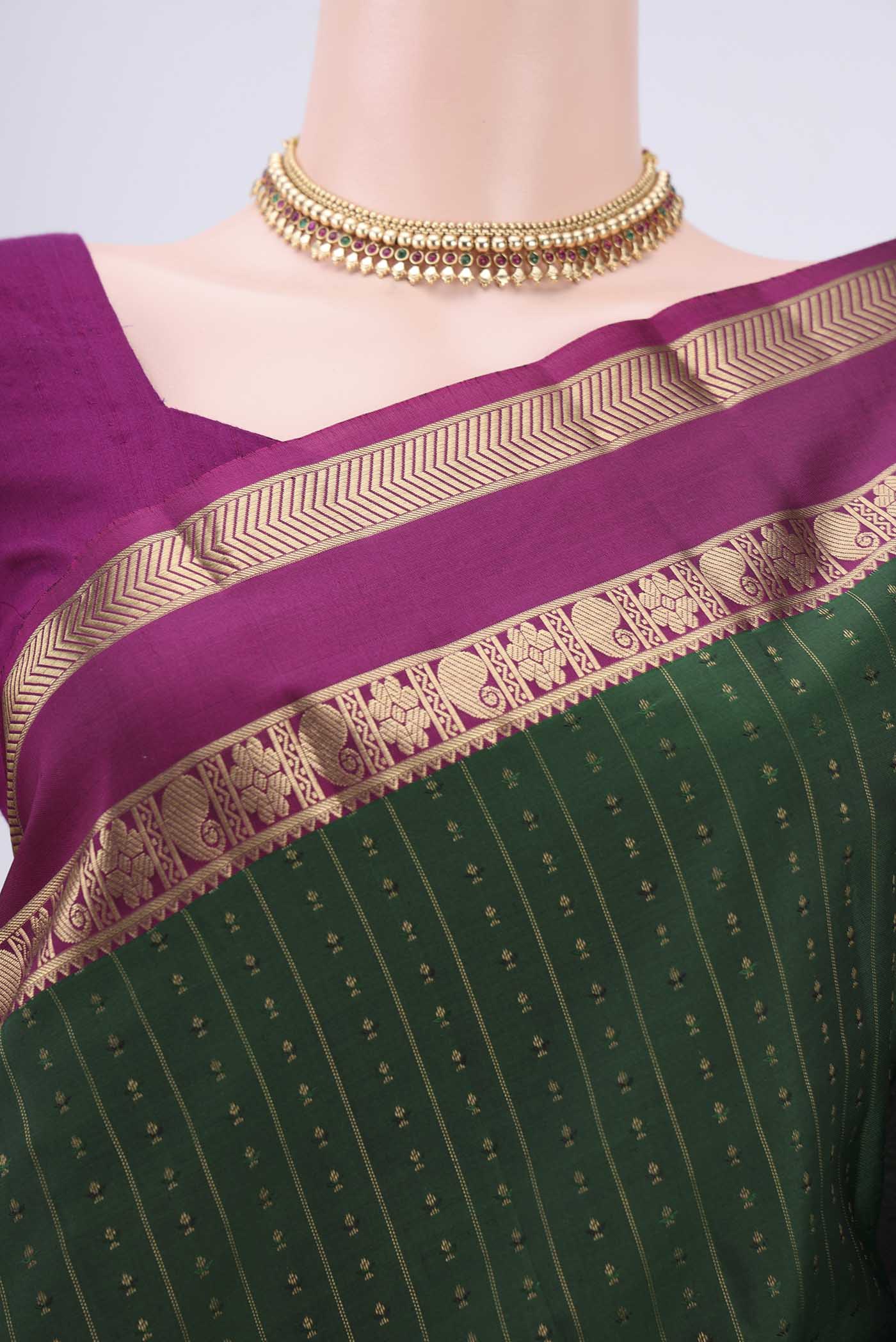Border image of Bottle Green Kanchipuram Silk Saree with Zari Butta on the body and Zari Border. 