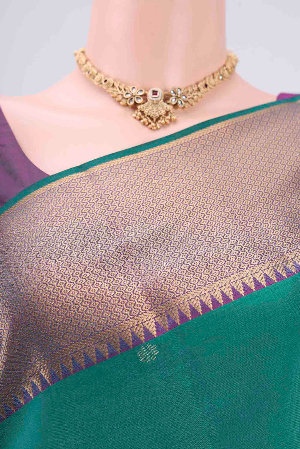 Border image of Green Kanchipuram Silk Saree with Zari Butta on the body and Zari Border. 
