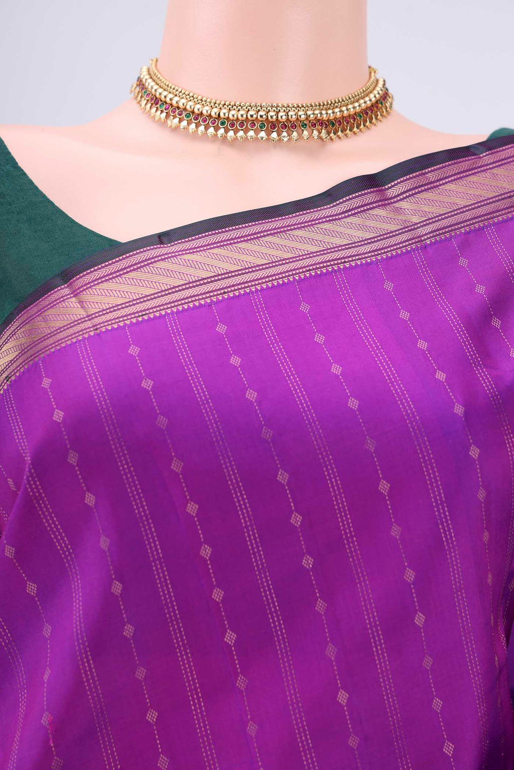 Border image of Magenta Kanchipuram Silk Saree with Zari Butta on the body and Zari Border. 
