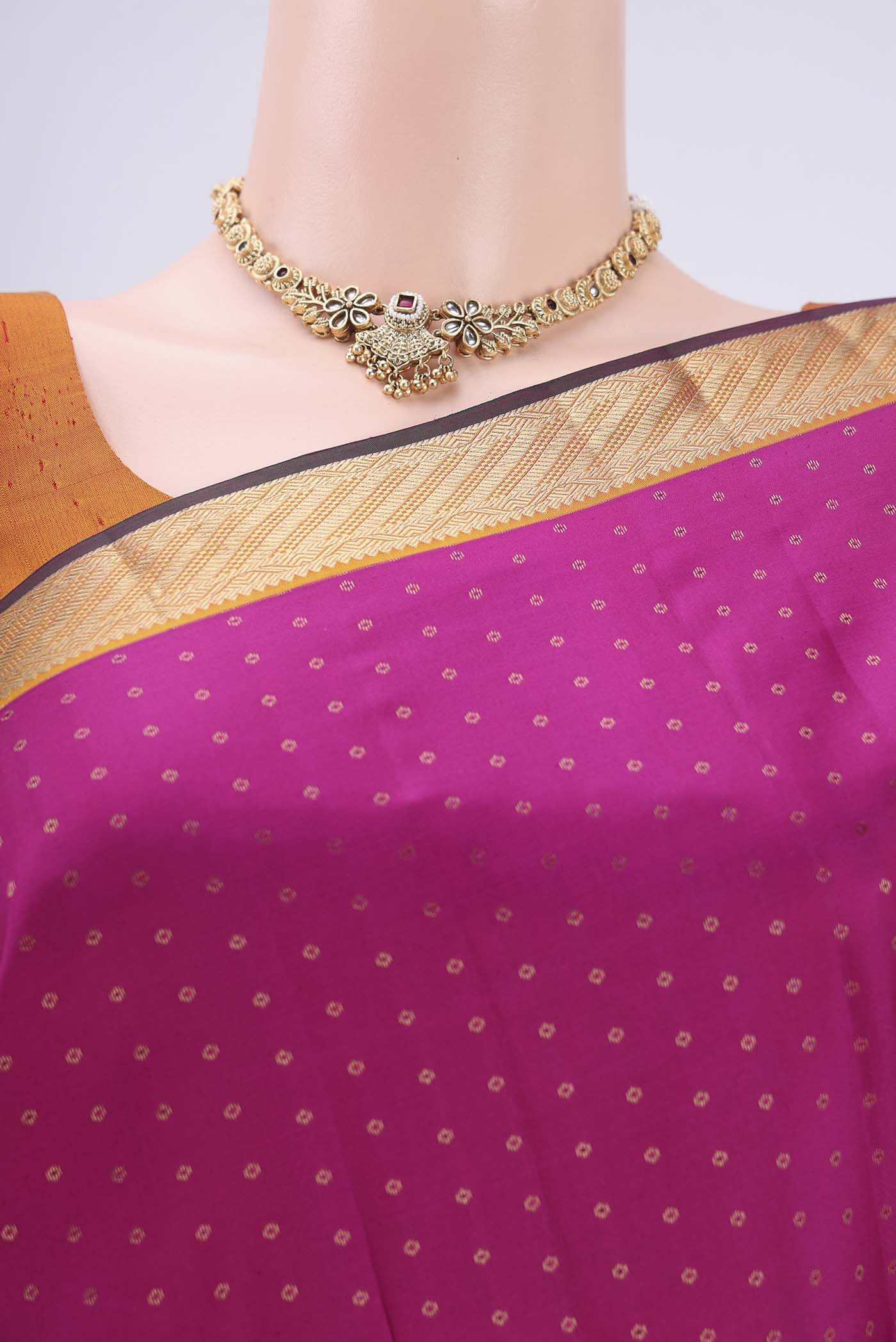 Border image of Pink Kanchipuram Silk Saree with Zari Butta on the body and Zari Border. 