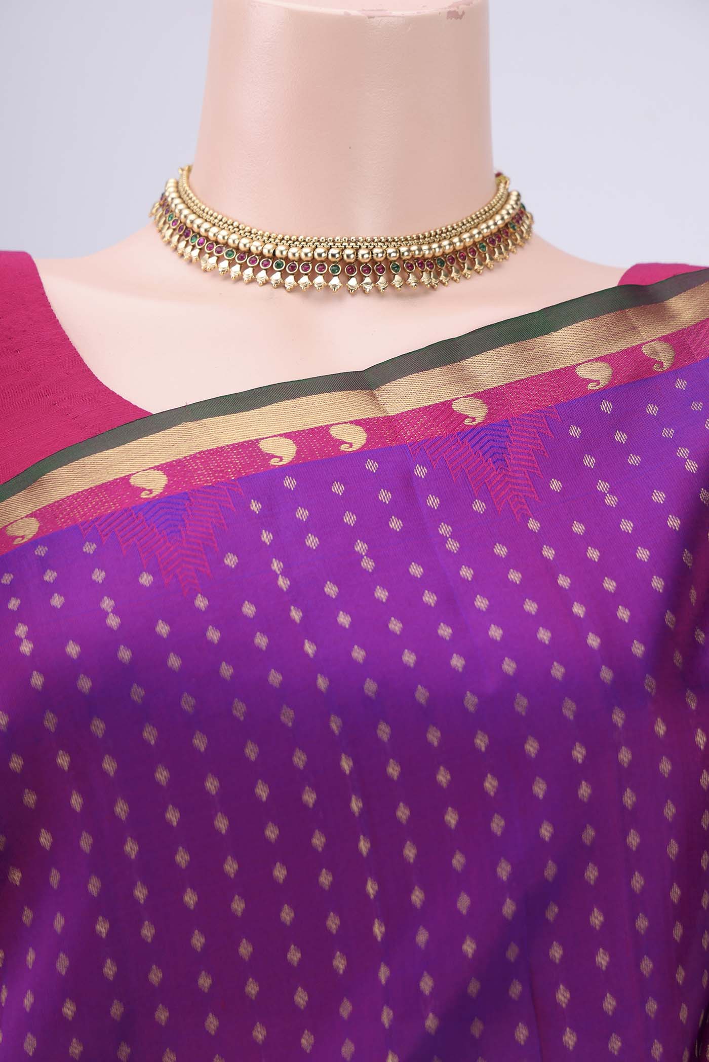 Border image of Magenta Kanchipuram Silk Saree with Zari Butta on the body and Zari Border. 